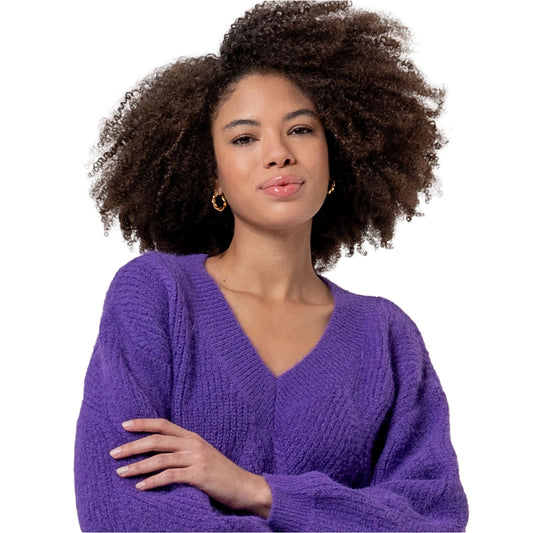 Maglione a trecce scollo a V