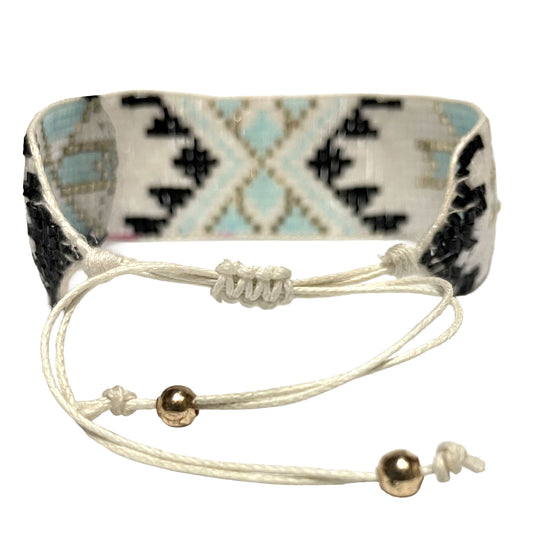 SURKANA Bracciali alti perline giapponesi celesti