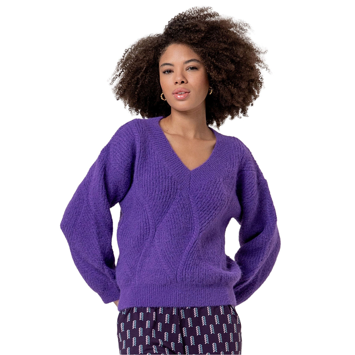 Maglione a trecce scollo a V