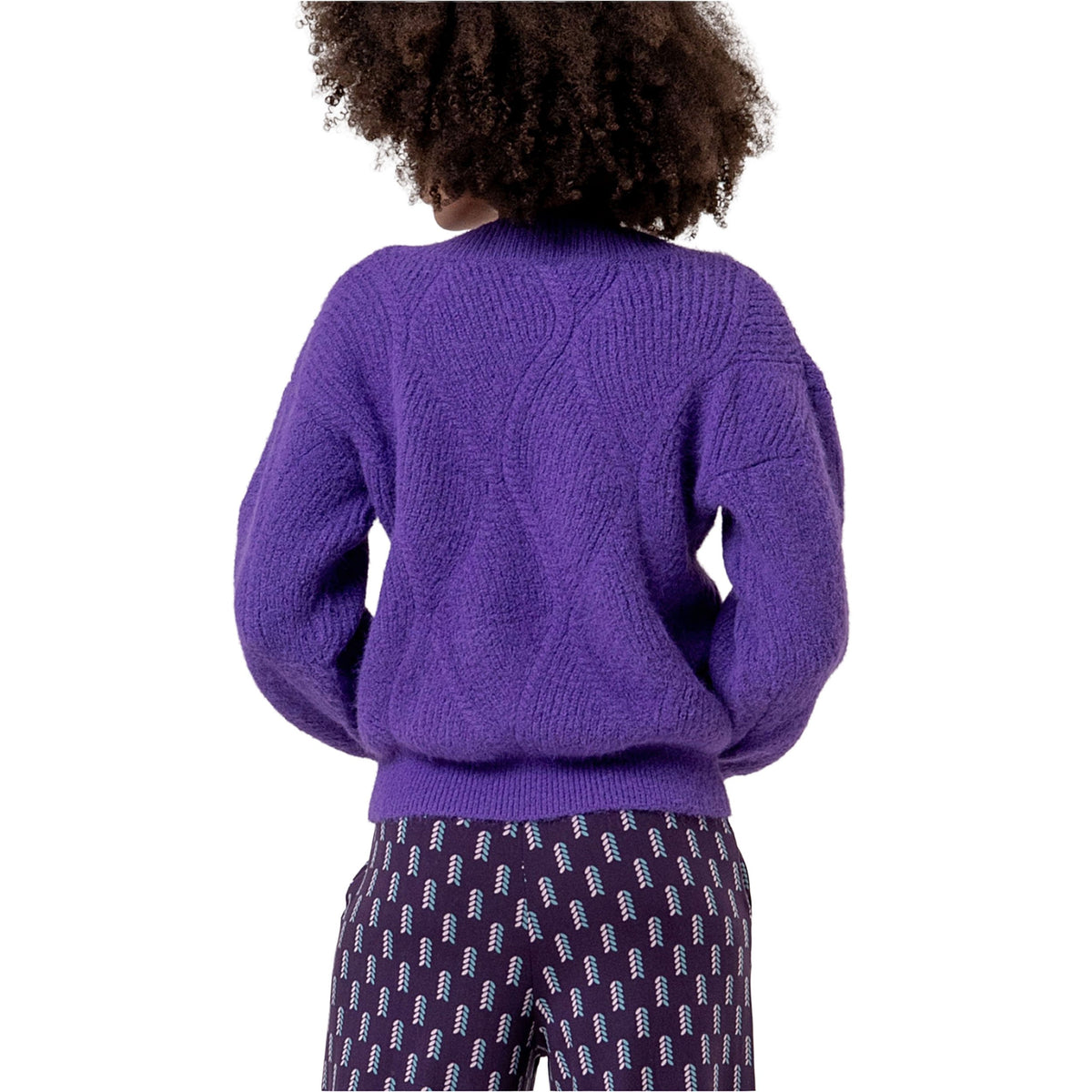 Maglione a trecce scollo a V